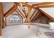 Large room with vaulted ceiling with beam accents, neutral carpet and scenic views at 300 Gold Hill Rd, Breckenridge, CO 80424