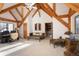 Comfortable bonus room with beamed ceilings, plush seating, and a cozy desk space with mountain views at 300 Gold Hill Rd, Breckenridge, CO 80424