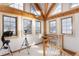 Bonus room with three windows to views and beam accents on the ceiling at 300 Gold Hill Rd, Breckenridge, CO 80424