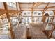 Open floor plan showcasing exposed wood beams, beautiful tile floors and abundant natural light at 300 Gold Hill Rd, Breckenridge, CO 80424