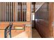 This horse stall features wood framing with metal bars, providing a safe and comfortable space for your equine companion at 300 Gold Hill Rd, Breckenridge, CO 80424