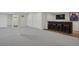 Expansive finished basement with access to bar area and bathroom with walk in shower at 9669 E Prentice Cir, Greenwood Village, CO 80111