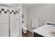 Modern bathroom with tile shower featuring glass doors and sleek fixtures at 9669 E Prentice Cir, Greenwood Village, CO 80111