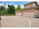 Spacious three-car garage with basketball hoop, ideal for sports and parking at 9669 E Prentice Cir, Greenwood Village, CO 80111