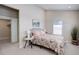 Bright bedroom with neutral walls, plush carpeting, and a view to the closet at 19810 County Road 1, Berthoud, CO 80513