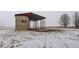 Exterior shot of a unique silo with a metal roof and frame in a rural setting at 19810 County Road 1, Berthoud, CO 80513