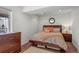 Finished basement bedroom with wood trim and modern decor at 24355 E Briarwood Ave, Aurora, CO 80016