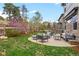 Covered patio with seating surrounded by greenery at 24355 E Briarwood Ave, Aurora, CO 80016