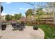 Outdoor patio area with seating and a firepit at 24355 E Briarwood Ave, Aurora, CO 80016