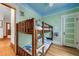 Bedroom with bunk beds and colorful wall decorations at 3361 W 29Th Ave, Denver, CO 80211
