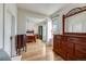 Spacious hallway with hardwood floors and view into bedroom at 3361 W 29Th Ave, Denver, CO 80211