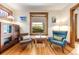 Cozy living room with hardwood floors, natural light, and comfortable seating, perfect for relaxation at 3361 W 29Th Ave, Denver, CO 80211