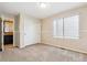 Spacious bedroom features a walk-in closet and a large window for plenty of natural light at 156 S Lindsey St, Castle Rock, CO 80104