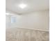 Spacious living room with neutral paint and carpet offers a blank canvas for any decor at 156 S Lindsey St, Castle Rock, CO 80104