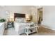 Comfortable bedroom featuring neutral tones, a walk-in shower, and stylish furnishings at 156 S Lindsey St, Castle Rock, CO 80104