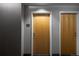 Apartment doors with a neutral color and hallway at 1700 Bassett St # 1119, Denver, CO 80202