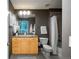 The bathroom features a granite vanity, wood cabinets, and shower-tub combination at 1700 Bassett St # 1119, Denver, CO 80202