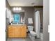 Well-lit bathroom featuring a granite countertop vanity and a shower-tub combination at 1700 Bassett St # 1119, Denver, CO 80202