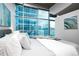 Bright bedroom with large windows offering amazing city views at 1700 Bassett St # 1119, Denver, CO 80202