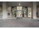 Grand building entrance featuring glass doors, a welcoming entrance mat, and prominent signage for easy identification at 1700 Bassett St # 1119, Denver, CO 80202