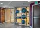 The exercise room features fitness balls in a rack, open doors, and a clean and organized layout at 1700 Bassett St # 1119, Denver, CO 80202