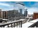 Modern glass building with views of the city and public transportation at 1700 Bassett St # 1119, Denver, CO 80202