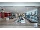 Spacious fitness center with treadmills, weight machines, and natural light at 1700 Bassett St # 1119, Denver, CO 80202