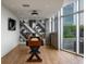 Inviting game room with shuffleboard table, contemporary decor, and expansive windows offering city views at 1700 Bassett St # 1119, Denver, CO 80202