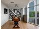 Entertainment room with a shuffleboard table, modern design and large window at 1700 Bassett St # 1119, Denver, CO 80202