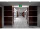 Bright hallway with modern tile flooring, wood accents and 'Exit' sign at 1700 Bassett St # 1119, Denver, CO 80202