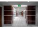 Hallway decorated with tile floors and wood trim columns at 1700 Bassett St # 1119, Denver, CO 80202