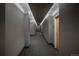 Apartment hallway featuring carpeted floors and neutral wall colors at 1700 Bassett St # 1119, Denver, CO 80202