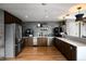 Modern kitchen area featuring stainless steel appliances and ample counter space at 1700 Bassett St # 1119, Denver, CO 80202