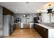 Modern community kitchen area featuring stainless steel appliances, sleek cabinetry, and ample counter space at 1700 Bassett St # 1119, Denver, CO 80202