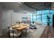 Bright living room featuring floor-to-ceiling windows, city views, and modern decor at 1700 Bassett St # 1119, Denver, CO 80202