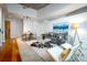 Open-concept living area with a modern kitchen, dining, and sitting area at 1700 Bassett St # 1119, Denver, CO 80202