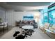 Inviting living room with neutral palette, stylish furnishings, and scenic views at 1700 Bassett St # 1119, Denver, CO 80202