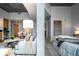 Open concept living room showcasing modern decor, neutral tones, and seamless flow to the bedroom at 1700 Bassett St # 1119, Denver, CO 80202