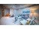 Charming living room with cozy seating, stylish decor, and modern art at 1700 Bassett St # 1119, Denver, CO 80202