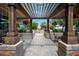Charming outdoor lounge area featuring a fireplace, pergola, and comfortable seating at 1700 Bassett St # 1119, Denver, CO 80202