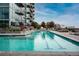 Stunning rooftop pool with comfortable lounge chairs and beautiful landscaping at 1700 Bassett St # 1119, Denver, CO 80202