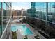 Relaxing rooftop pool with lounge chairs and city views at 1700 Bassett St # 1119, Denver, CO 80202