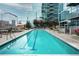 Outdoor swimming pool offers a refreshing amenity with clear water and lounge chairs at 1700 Bassett St # 1119, Denver, CO 80202