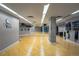 The yoga studio features hardwood floors, mirrored walls, and wall mounted equipment at 1700 Bassett St # 1119, Denver, CO 80202