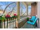 Private balcony with brick columns and two chairs at 45 Jackson St # A, Denver, CO 80206