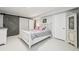 Basement bedroom with sliding barn door and adjacent closet at 45 Jackson St # A, Denver, CO 80206