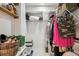 Walk-in closet with shelving and hanging rods at 45 Jackson St # A, Denver, CO 80206