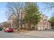 Side view of the building, showcasing attached garages and additional landscaping at 45 Jackson St # A, Denver, CO 80206