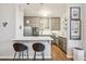 Modern kitchen with stainless steel appliances and white cabinets at 45 Jackson St # A, Denver, CO 80206