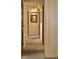 Hallway with neutral walls, carpeting, and framed artwork, creating a serene and welcoming atmosphere at 8932 Eastridge Rd, Golden, CO 80403